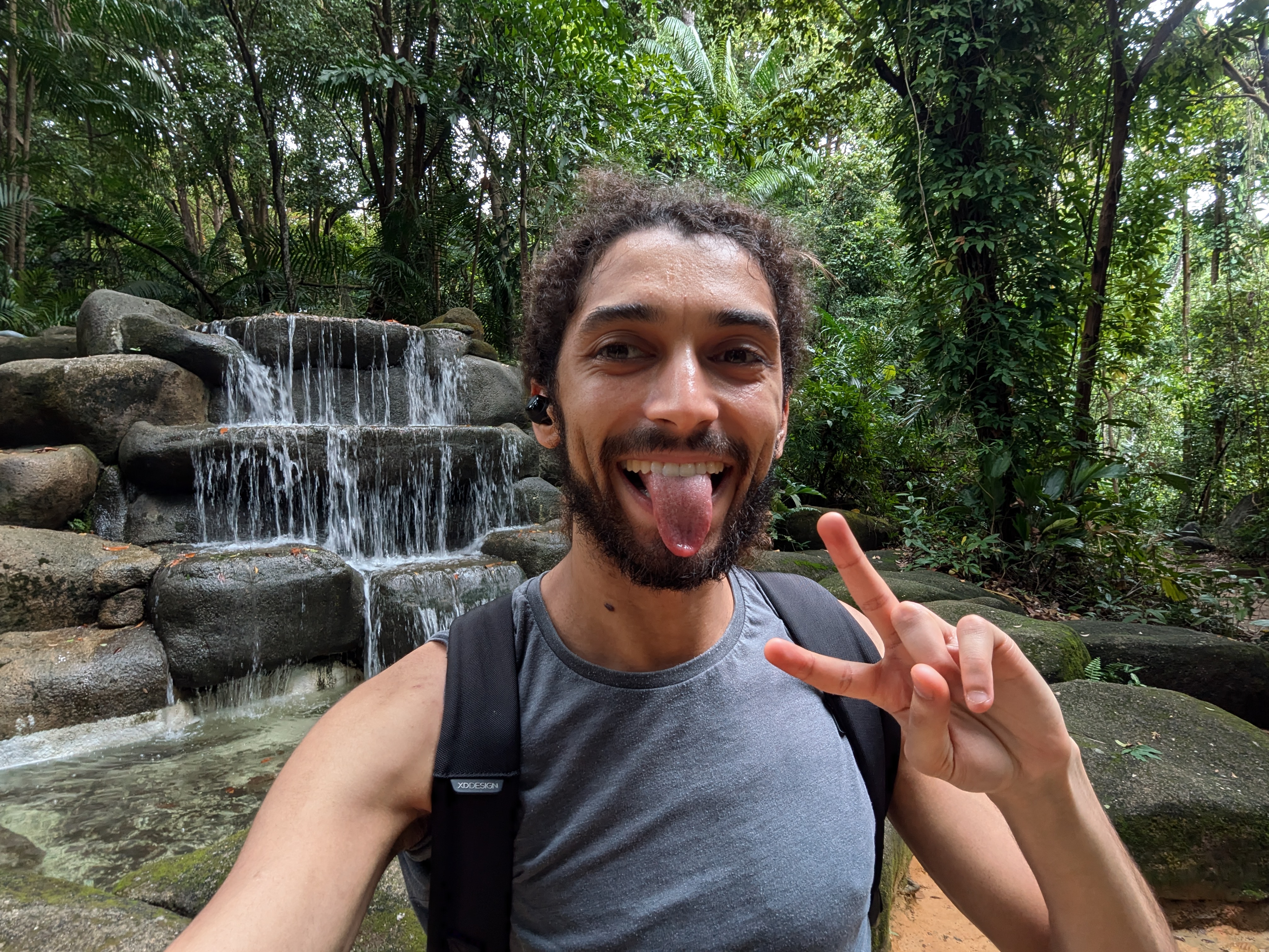 Ryel moving like water, going with the flow - smiling via a small water feature